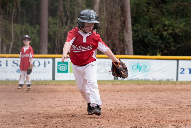 Nathan fielding a ball at pitcher