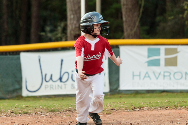 Nathan running to third base