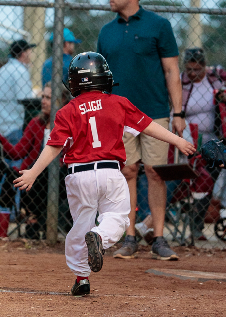 Nathan scoring a run